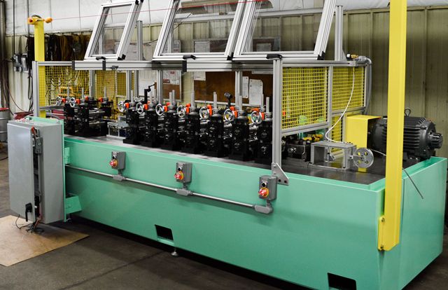An Addison TIG tube mill with its guarding and controls
